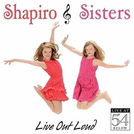 Milly with sister on cover of Live out Loud